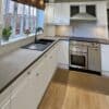 White Wrap Kitchen Makeover After Picture with Re-New-it